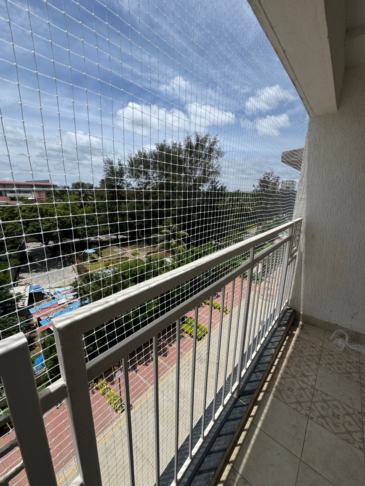 Pigeon Net Installation in Classic Orchards Layout, Kalena Agrahara, Bannerghatta Road, Bengaluru - Kutbi Aluminium Glass & Hardware
