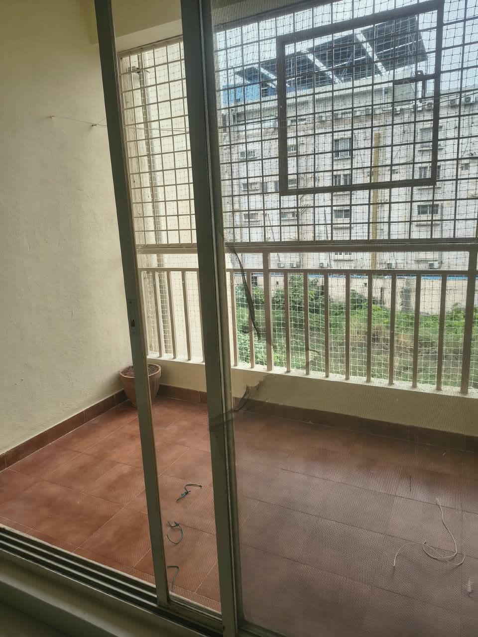 Pigeon Net Installation at Radiant White Orchid, Bannerghatta Road, Bengaluru - Kutbi Aluminium Glass & Hardware (After / Completed Work)