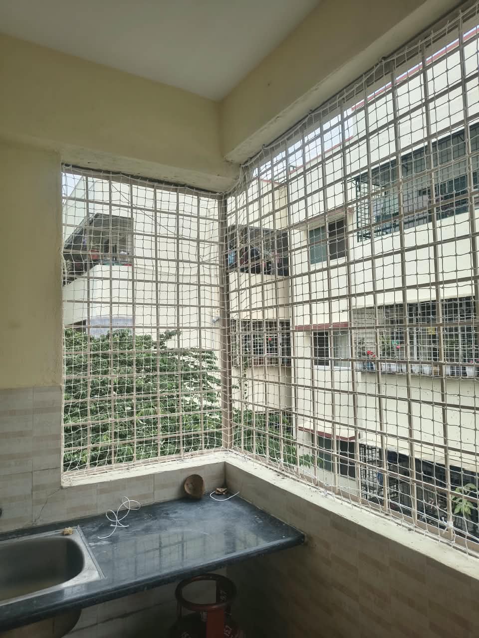 Pigeon Net Installation at Radiant White Orchid, Bannerghatta Road, Bengaluru - Kutbi Aluminium Glass & Hardware (After / Completed Work)