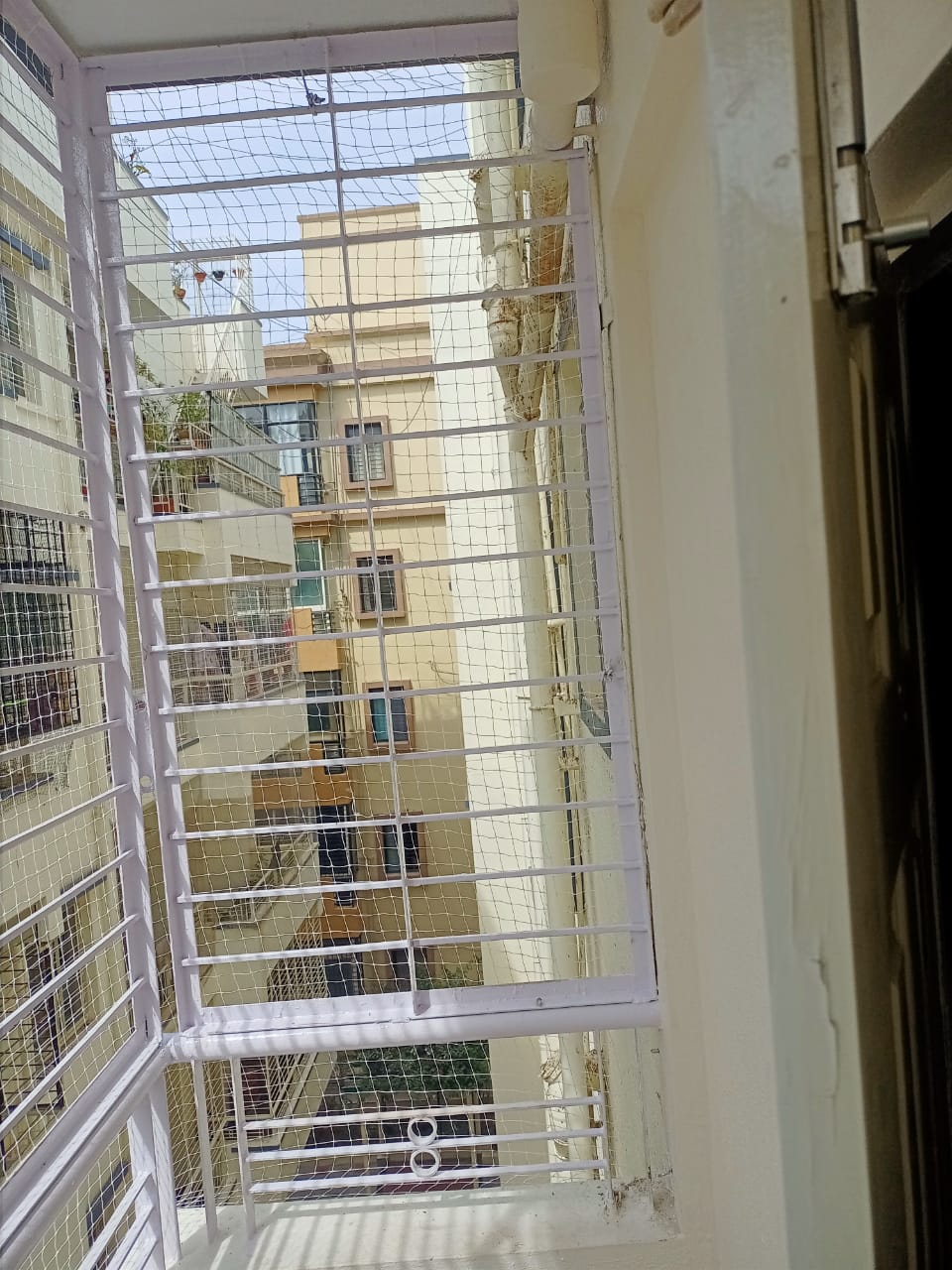 Pigeon net installation by Kutbi in Kanakapura, Bengaluru