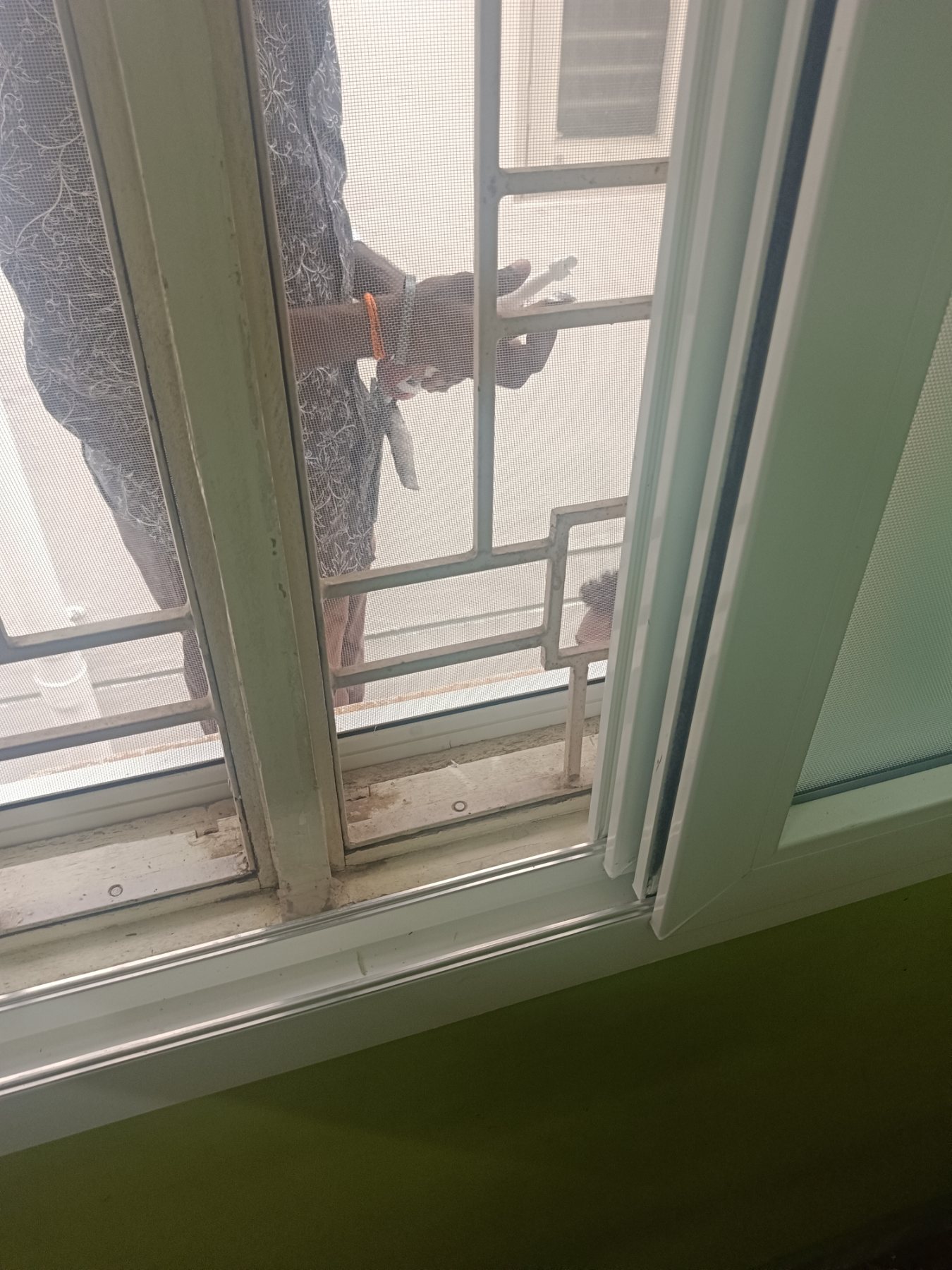 uPVC Sliding Window Installation with Mosquito Mesh at Bohra Layout, Bengaluru - Kutbi Aluminium Glass & Hardware